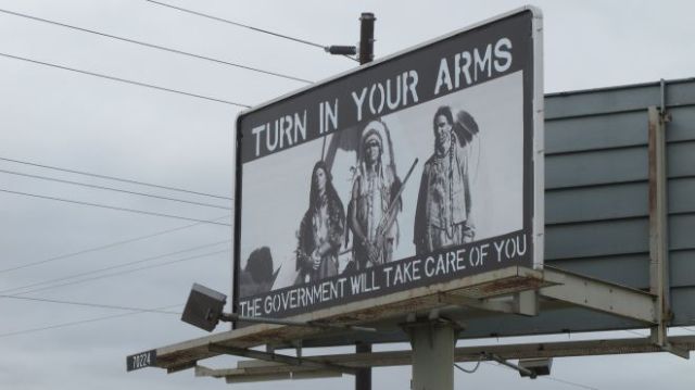 turn in your arms CulturalAppropriationGunBillboard_zps5b6d5263