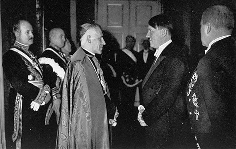on July 14, 1933, the Vatican and the Nazi government signed a Concordat, putting their official stamp on an alliance between the Catholic Church and the Nazi Fascist State. Article 16, required that the Catholic bishops “swear and promise before God and on the Holy Gospels” to honor the Nazi Reich, and to make the clergy of the diocese do the same, and to hunt for to avoid all detrimental acts which might endanger it. By drafting and signing the Concordat, the Vatican had literally ordered German Catholics to support the Nazis, telling millions of Catholics not only in Germany but worldwide that the Pope was allies with fascism, and that they should ally with it as well. Catholics were to avoid all subversive or illegal activities against the Nazi government. In the Reichskonkordat, the Vatican had promised that the German Catholic school educators would teach the children to love the Nazi state (Article 21).  
